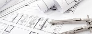 Byggritningar och passare vid projektering